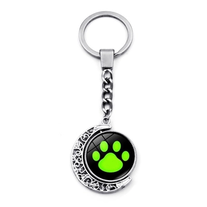 Cartoon ladybug crescent moon keychain with green paw print charm on silver alloy chain