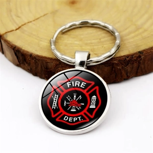 Fire Dept keychain with firefighter emblem on rustic wooden base for car keys and bags