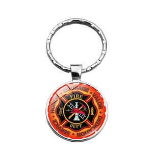 Silver firefighter keychain with emblem featuring honor courage valor service and dedication