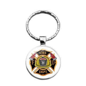 Silver metal keychain featuring a circular fire department emblem with a red and yellow logo