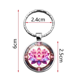 Silver metal keychain with lotus flower pendant showing dimensions 6cm total length