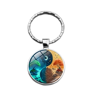 Detailed macro view of the Yin Yang Tree of Life glass cabochon with silver metal ring