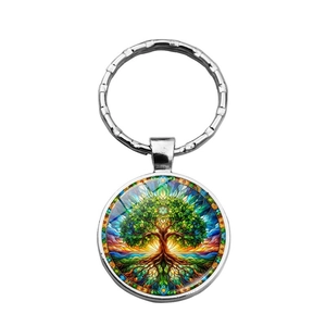 Silver Tree of Life keychain with colorful artistic glass dome pendant on white backdrop