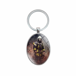 Oval firefighter keychain with hero image on smoke background in silver metal ring