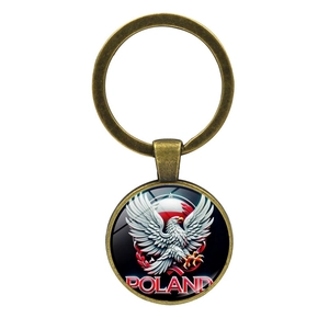 Vintage bronze Poland national emblem keychain featuring a white eagle and POLAND text