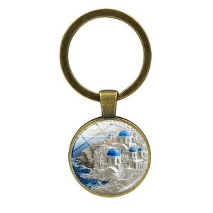 Vintage bronze Santorini key ring with 3D embossed blue dome architecture pendant