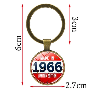 Retro 1966 limited edition keychain in bronze metal with a vintage industrial finish