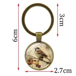 Vintage bronze bird and cherry tree keychain pendant with 2.7cm glass cabochon