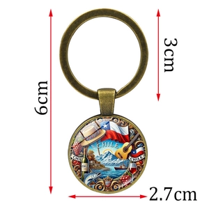 Vintage Bronze Chile Schlüsselanhänger mit Symbolen und Maßangaben auf Weiß
