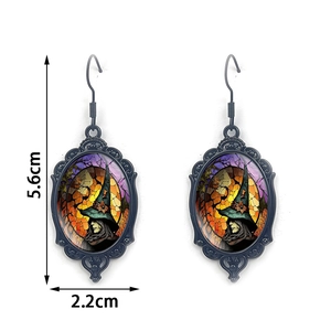 Gothic Halloween witch earrings with oval stained glass design and size dimensions