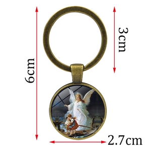 Porte-clés ange vintage en bronze avec dimensions longueur 6cm et diamètre de l'anneau 3cm