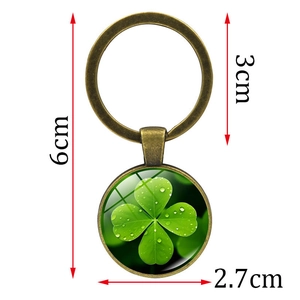 Lucky four leaf clover keychain with bronze finish metal ring and glass pendant