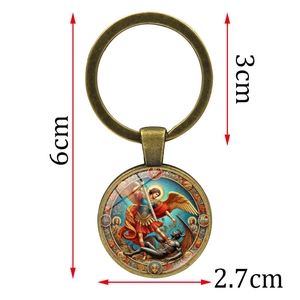 Archangel Michael vanquishing demon bronze keychain with glass pendant and metal ring