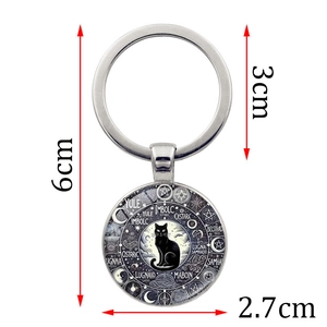 Porte-clés chat noir mystique en verre cabochon avec symboles païens de l'année