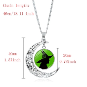 Detailed view of silver moon pendant with witch silhouette and exact size dimensions
