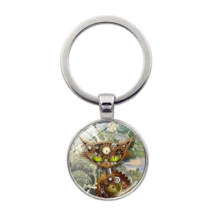 Portachiavi gatto meccanico steampunk con occhi verdi e ingranaggi di orologio in argento