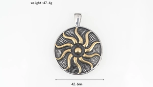 Close-up of titanium steel sunflower pendant with two-tone finish and wavy silver base