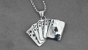Detail shot of titanium steel royal flush poker pendant on a sleek box chain necklace