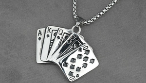 Detailed macro shot of vintage silver poker Royal Flush pendant on a box chain