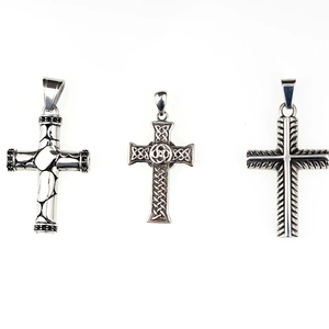 Three premium stainless steel cross pendants featuring Celtic knot and textured patterns
