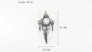 Macro detail of gothic skull pendant with white zircon stone and dimensions