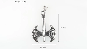 Detail view of Thor's axe pendant in titanium steel with engraved Viking style patterns