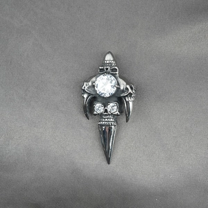 Gothic skull pendant necklace with large clear zircon and vintage steel claw details