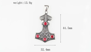 Detailed silver Mjolnir pendant with Celtic knots and red gemstones, 44.5mm height