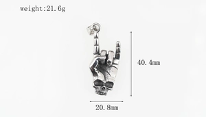 Detailed view of silver skeleton hand rock gesture pendant with dimensions and weight