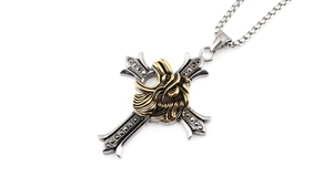Close-up of retro punk cross pendant with golden lion head and black textured details