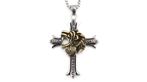 Detail of lion head on cross pendant with gold and silver dual-tone steel finish