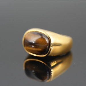 Vintage gold-plated titanium steel ring featuring an oval tiger eye stone inlay for men