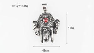 Détails du pendentif éléphant argenté vintage avec gemme rouge et poids de 38g