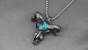 Detailed view of vintage ram skull pendant with turquoise stone on stainless steel chain