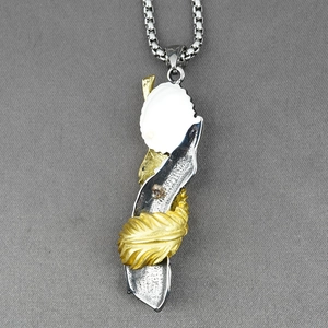 Two-tone titanium steel feather necklace with turquoise accents and silver box chain