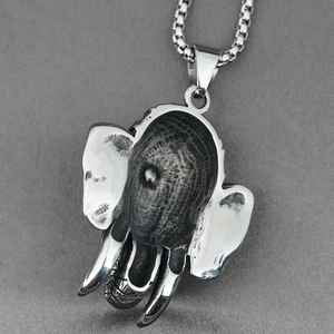 Collier avec pendentif tête d'éléphant vintage en acier inoxydable argenté