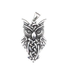 Vintage owl pendant necklace in retro silver steel with intricate Celtic knot engraving