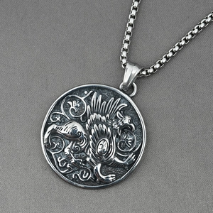 Silver griffin pendant necklace in stainless steel with vintage embossed relief design
