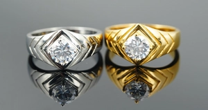 Detail of titanium steel wedding rings with round-cut crystals in gold and silver finish
