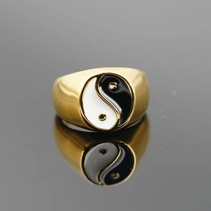 Classic gold titanium steel ring featuring a black and white Yin Yang Tai Chi enamel design