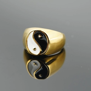 Polished gold titanium steel ring featuring classic black and white Tai Chi Yin Yang symbol