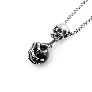 Retro punk skull and claw pendant necklace with black bead in polished vintage silver finish