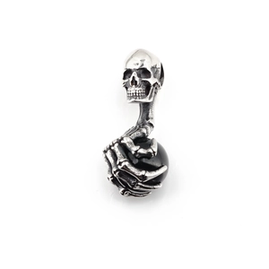 Retro punk titanium steel necklace featuring skull hand and black gemstone pendant