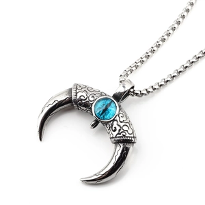 Collier vintage en acier oxydé avec pendentif corne de taureau et œil bleu turquoise