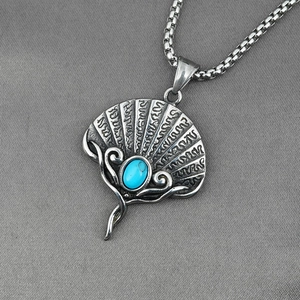 Vintage fan shaped steel necklace with turquoise inlay and textured engraving