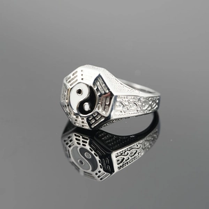 Classic silver titanium steel Tai Chi Bagua ring with polished reflective surface