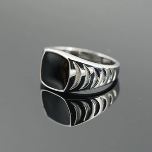 Vintage stainless steel ring for men with black enamel top and carved side details