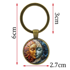 Porte-clés Soleil et Lune élégant en bronze avec détails de motif mosaïque rond