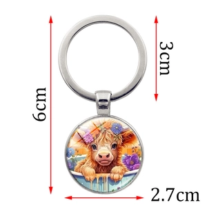 Detailed size specifications of the highland cow keychain with dimensions and silver metal ring