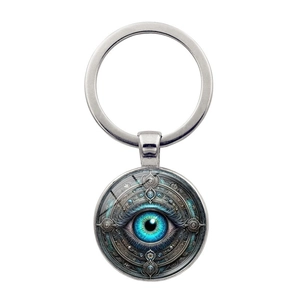 Evil eye keychain with mystical blue iris pendant and silver metallic ring on white background